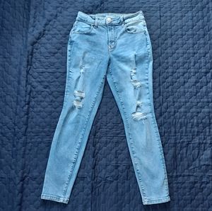 Light wash blue ripped jeans